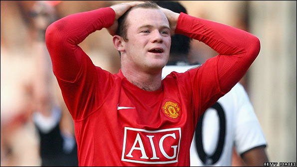 Man Utd's Wayne Rooney shows his disappointment