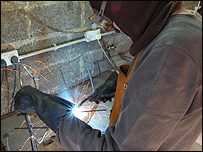 Tony works on a creation