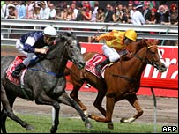Jockey Michael Rodd (L) on Efficient, who won the Melbourne Cup