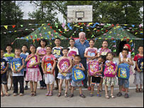 John with the children from Shifam School