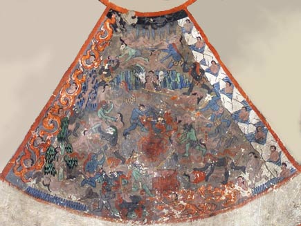 A section of the wheel diagram shows hell. The human figures here are being tortured by demons, burned in fire and frozen in ice