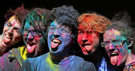 Men covered in multi-coloured dust in Dublin