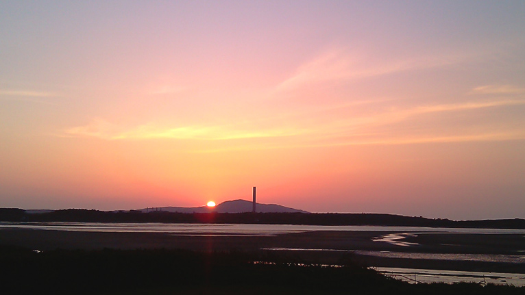 Sunset over Holyhead Mountain by Paul Glover