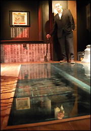 Gary Holmes and the Wandsworth gallows doors behind glass