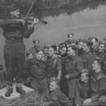 famous violinist and band leader Eugene Pini playing for his colleagues on 9th September 1941. My father is ringed.