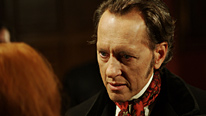 The sinister Dr Curlew (Richard E Grant)