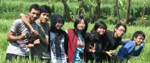 a group of young people in a paddy field in Indonesia