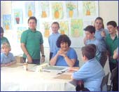 Image of pupils being taught to paint