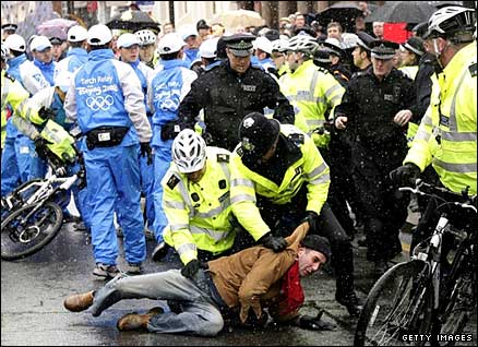 Chaos reigned as a protester tried to snatch the torch during the London leg