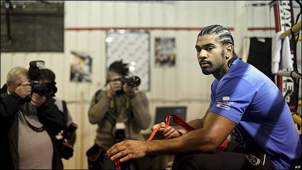 David Haye tapes his hands during a media session