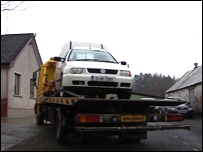 Vehicle being towed away