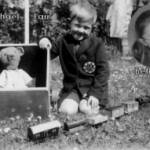 Michael Farr with his war time toys and -insert -Bethany his grand daughter.