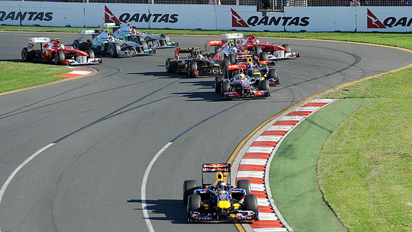 Sebastian Vettel leads the field at the first corner of the Australian Grand Prix