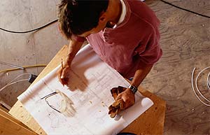 Builder looking at plans