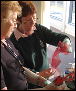 two ladies with ribbon