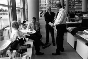 Norman Foster discusses future plans with his partners at their office overlooking the River Thames