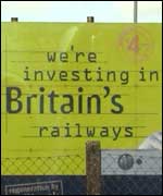 'We're investing in Britain's railways' sign