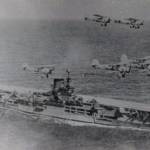 HMS Formidable, an Aircraft Carrier of the Illustrious class surrounded by five Swordfish - Torpedo Spotter Reconnaissance biplanes
