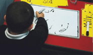 boy drawing a picture