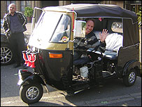 Craig (left) and the tuk-tuk
