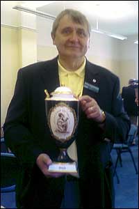 Person holding a 'slavery cup'.