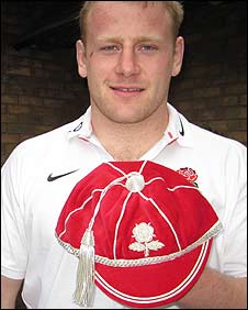 Dan Cole with his England cap
