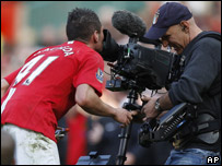 Federico Macheda kisses a TV camera in celebration of his first Manchester United goal