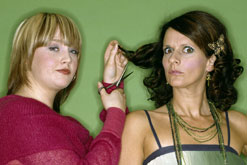 Rebecca Bellamy as Calypso Henshall and Sian Reeves as Sydney in series 4 of the hairdressing drama 'Cutting It'.