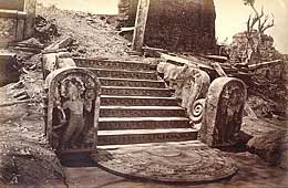 The entrance to a ruined circular Buddhist shrine ("vatadage") in Polonnaruwa