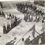 Girls dropping flower petals outside the Tomb Of The Unknown Warrior. Athens 1945, 'Occi Day'