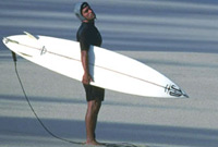 Pre-surf stretch, North Shore - Getty Images