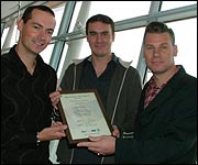 Paul Ralph receiving his award