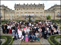 Carnival Messiah cast outside Harewood House