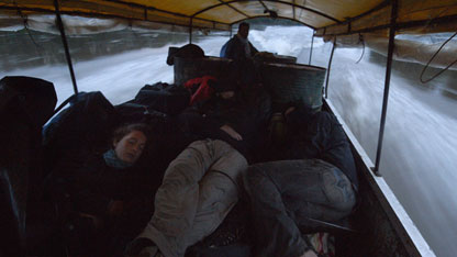 The team asleep on the boat
