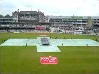 A grim sight - covers on at The Oval