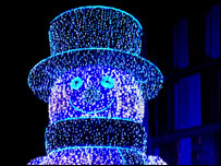 Illuminated snowman by James Passas