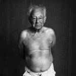 My father, Frans Banning, survivor of the Sumatra Railways, poses, dressed as a slave labourer, for 'Traces of War' in 2001.