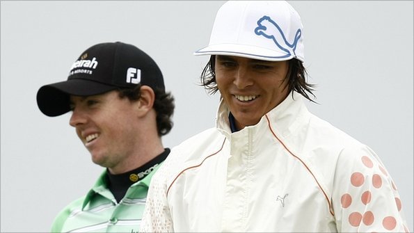 Rickie Fowler and Rory McIlroy share a joke during thier round together at Sandwich