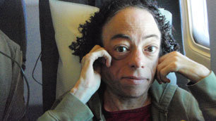 Liz's attempt at adopting the brace position isn't very effective