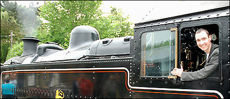 Steve Bailey in cab of steam locomotive