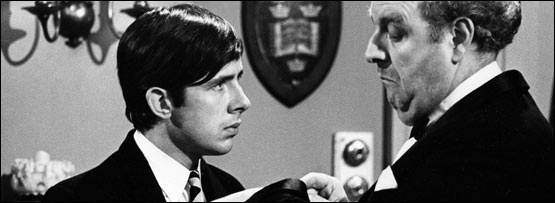 A boss looking at his watch