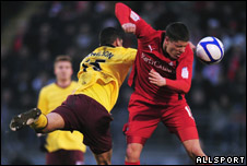 Alex Revell of Leyton Orient (R) and Denilson of Arsenal