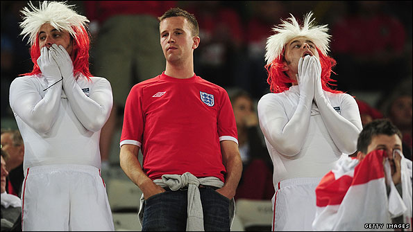 England fans show their disappointment after the defeat against Germany