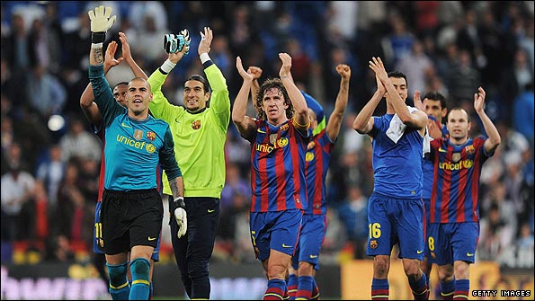 Barcelona's players, including Valdes (l) and Puyol (c) celebrate victory over Real. Pic: Getty