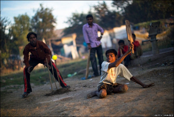A boy disabled by the Bhopal gas leak playing cricket