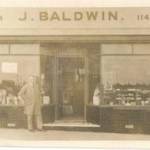 Father's shop on Rodway Road, in Patchway, Bristol, which sold groceries, confectioneries and was a tobacconist, as it would have appeared throughout its war years, except that during the blitz period it had folding wooden shutters as protection against flying debris.