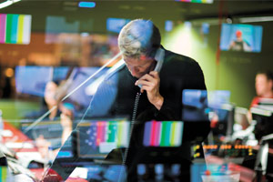 A man using a telephone in Studio A Gallery, Pacific Quay