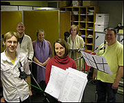 Members of the cast in the studio 