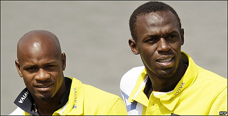 Usain Bolt (dcha.) y Asafa Powell