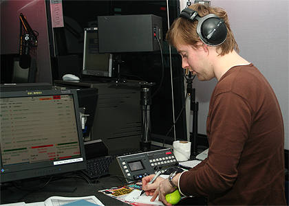 Ricky makes some notes whilst holding THE tennis ball from the 'Modern Way' video.